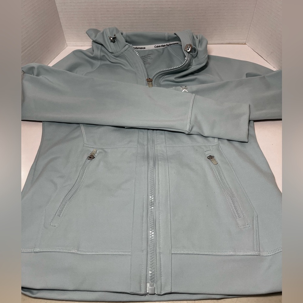 Calvin Klein Performance Embrace Raglan Sleeve Jacket - Picture 1 of 8